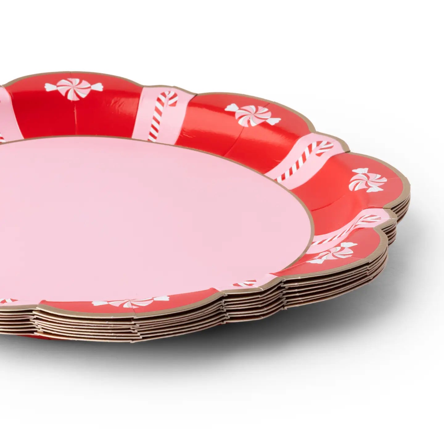 Scalloped Christmas paper plate with peppermint candies and candy canes
