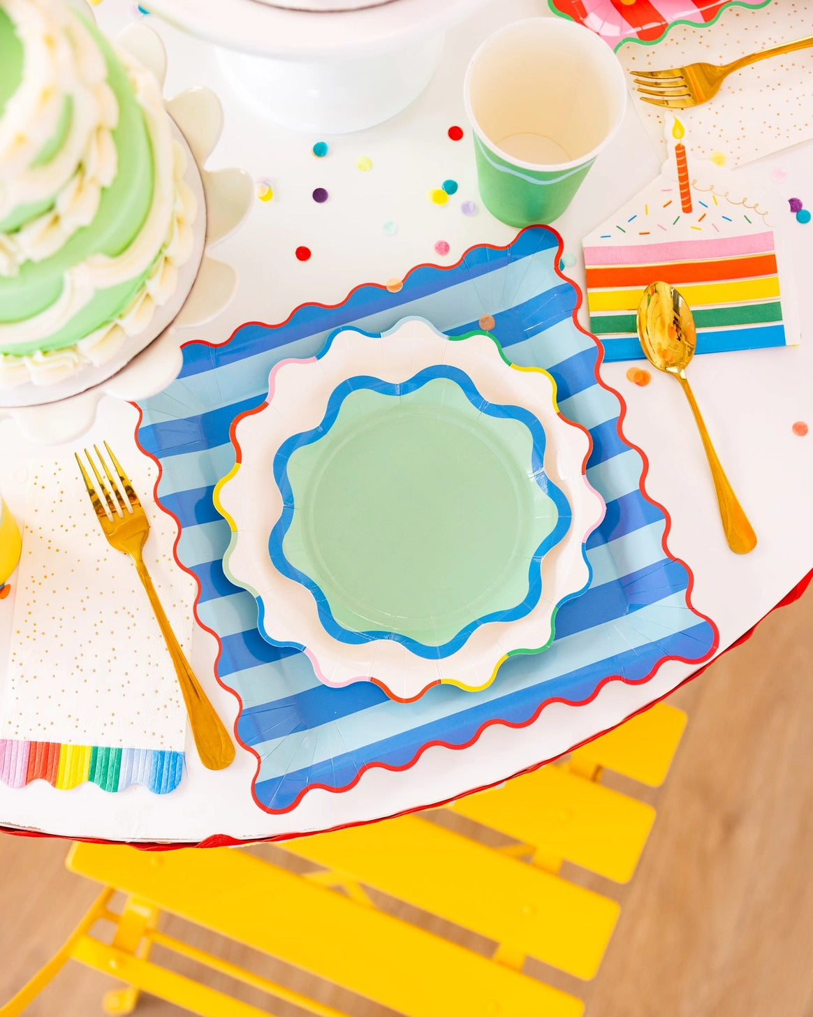Bright birthday plates featuring blue and aqua stripes