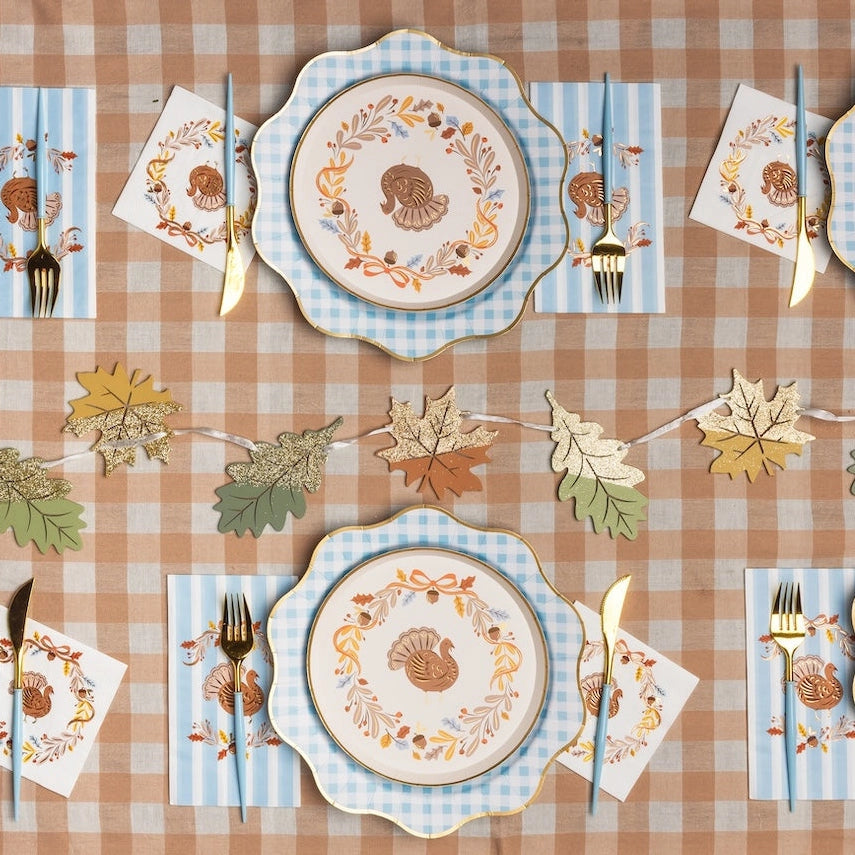 Thanksgiving guest towels styled with coordinating fall tableware
