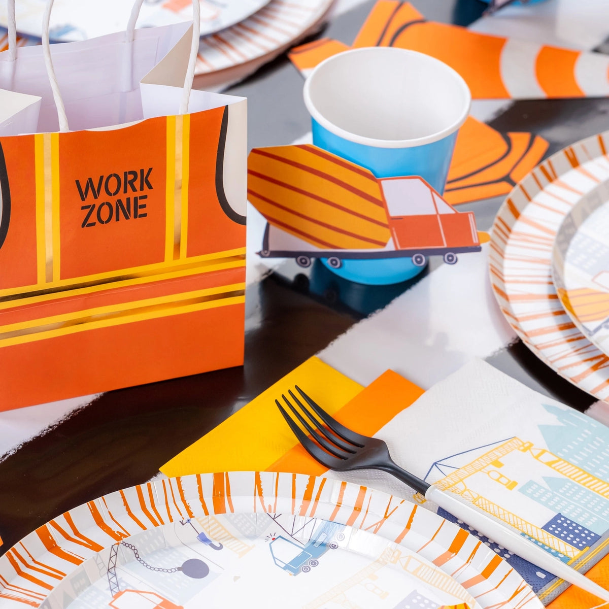 Children's party tableware with construction theme