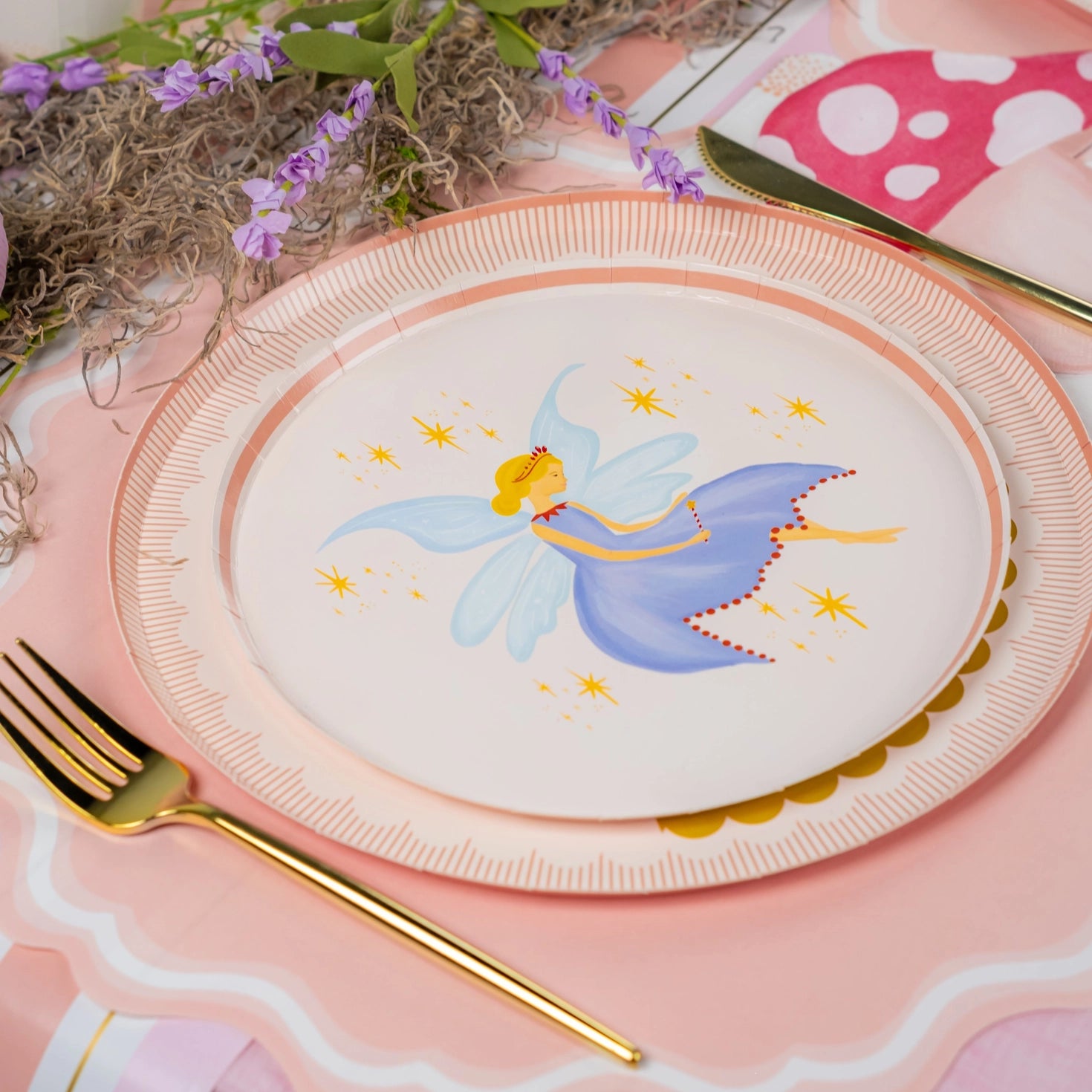 Pastel fairy dessert plates with whimsical fairy illustrations and soft star details