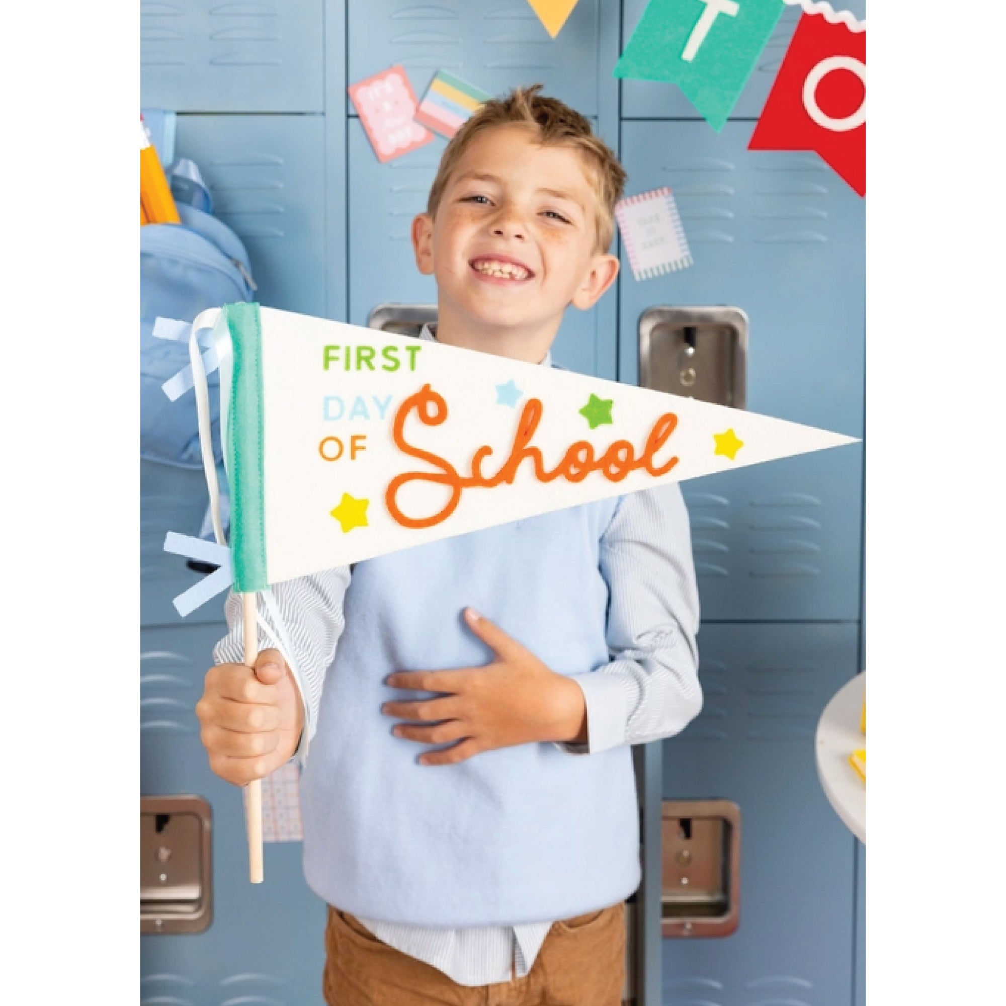 White felt school pennant with wooden dowel and ribbon