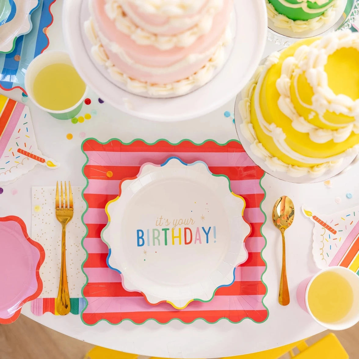 Colorful rainbow party napkins with gold foil detail