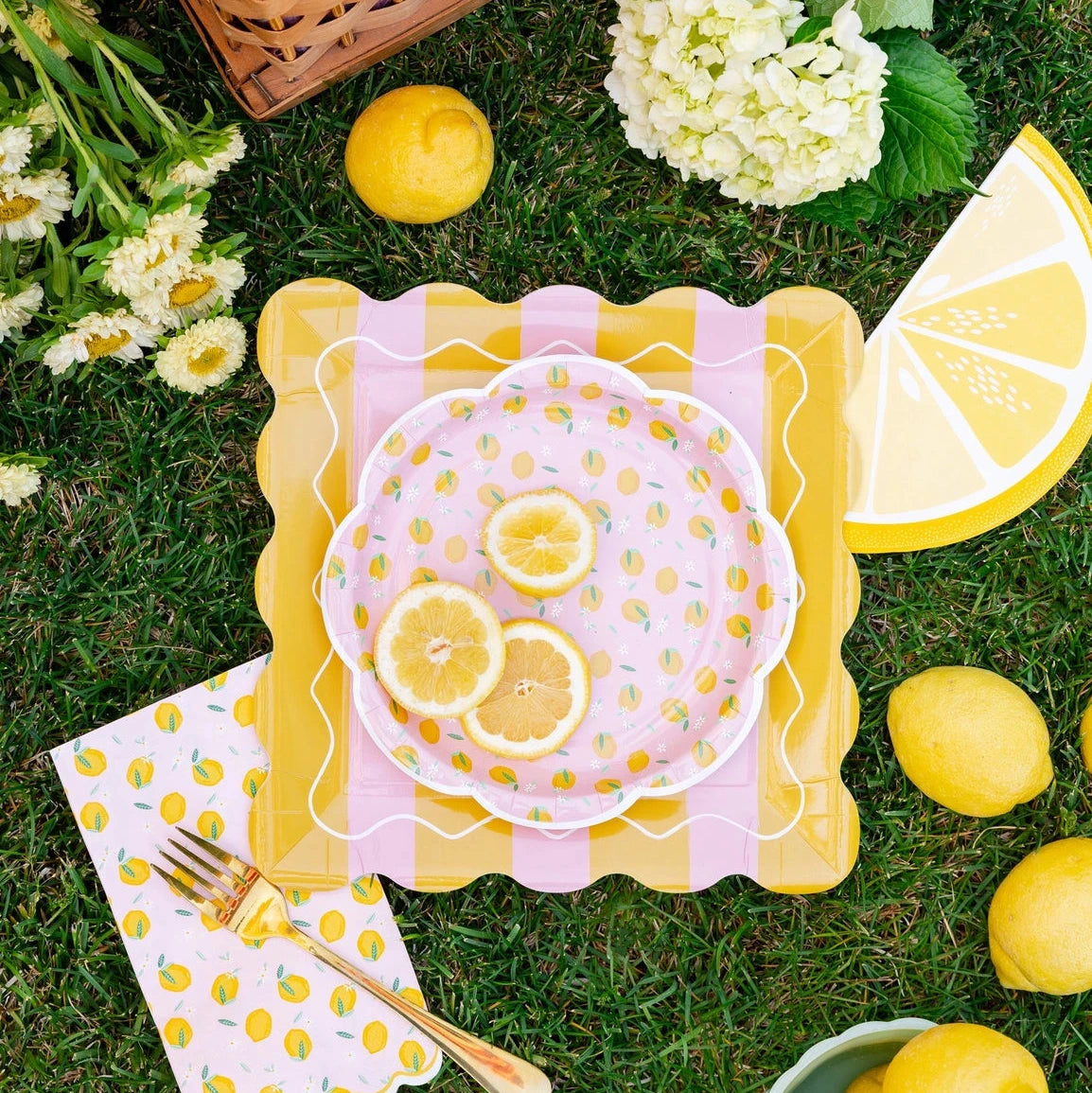 Pink and yellow lemon plates for summer parties