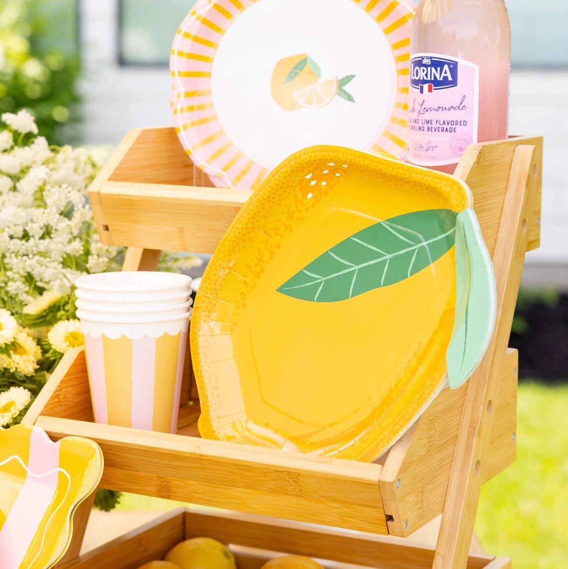 Lemon shaped lunch plates with bright yellow citrus design