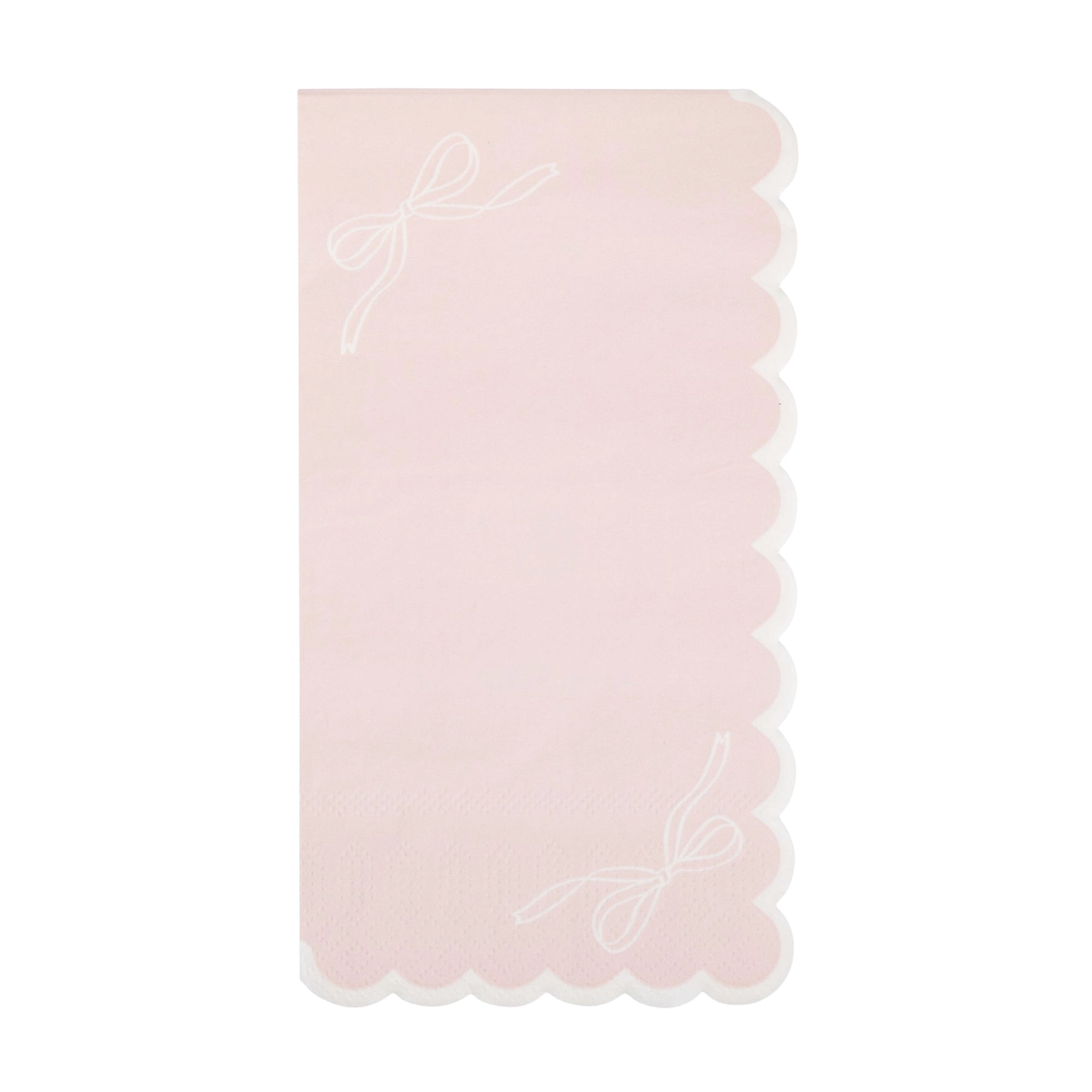 Pink guest towel with white bow accents