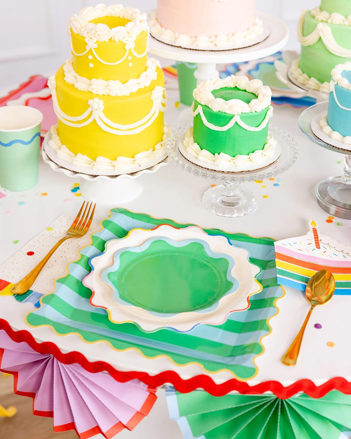 Assorted striped dinner plates in four colorful designs