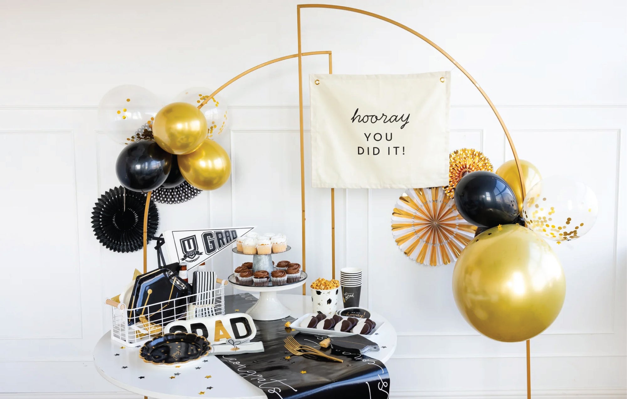 Black and gold graduation party decor dessert table