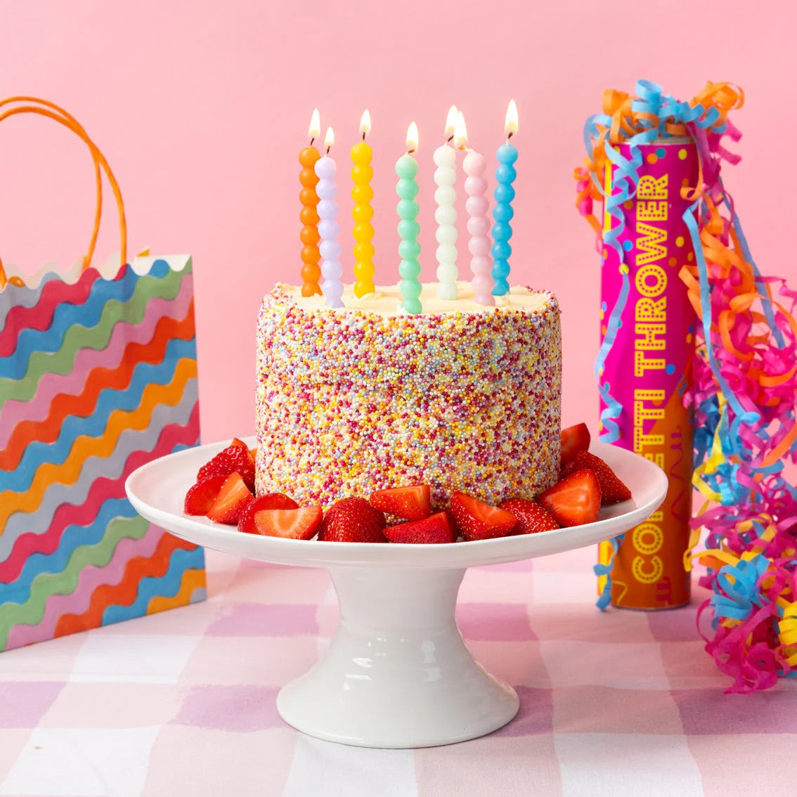 Bobble Multicolored Candles lit on a birthday cake | The Party Darling