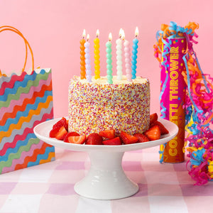 Bobble Multicolored Candles lit on a birthday cake | The Party Darling
