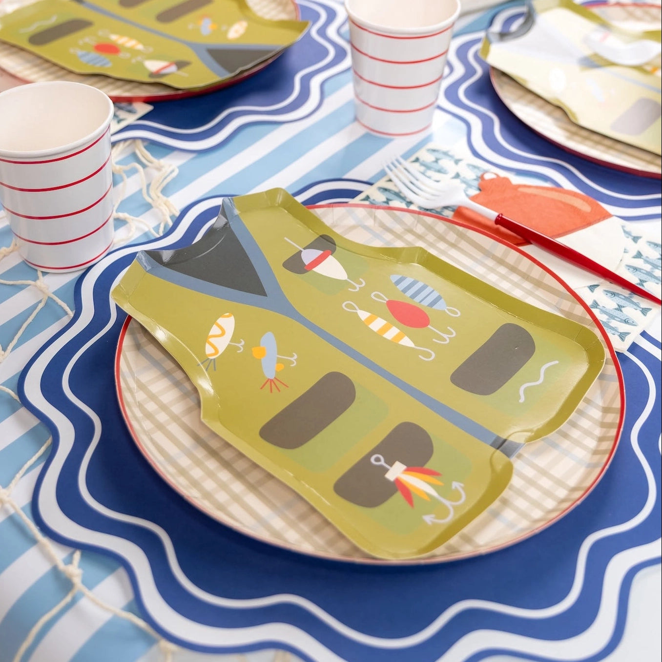 Fishing-themed lunch plate with lure illustrations