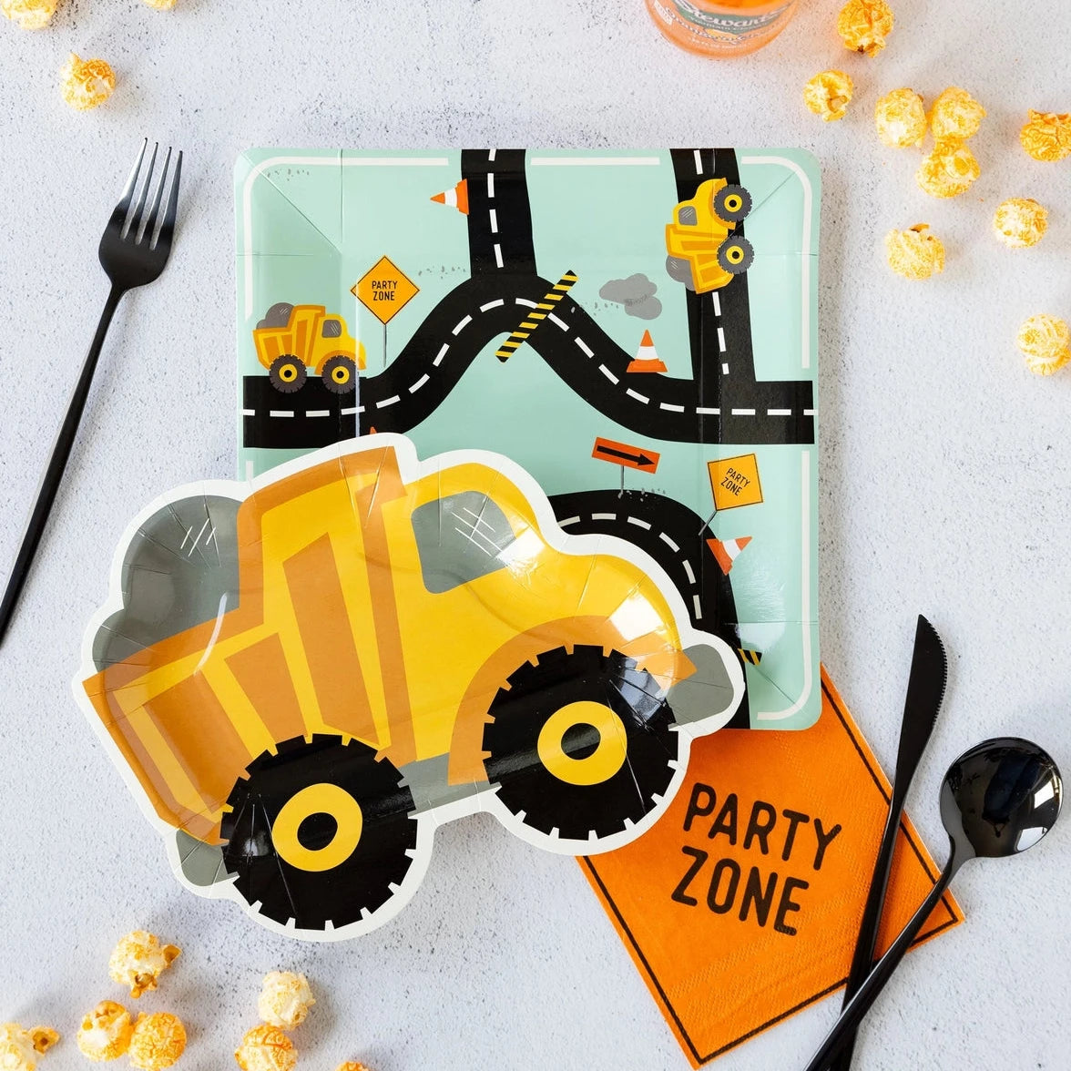 Work zone themed dessert napkins displayed on party table
