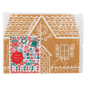 Packaged paper placemats with gingerbread house design and festive sitcker sheets
