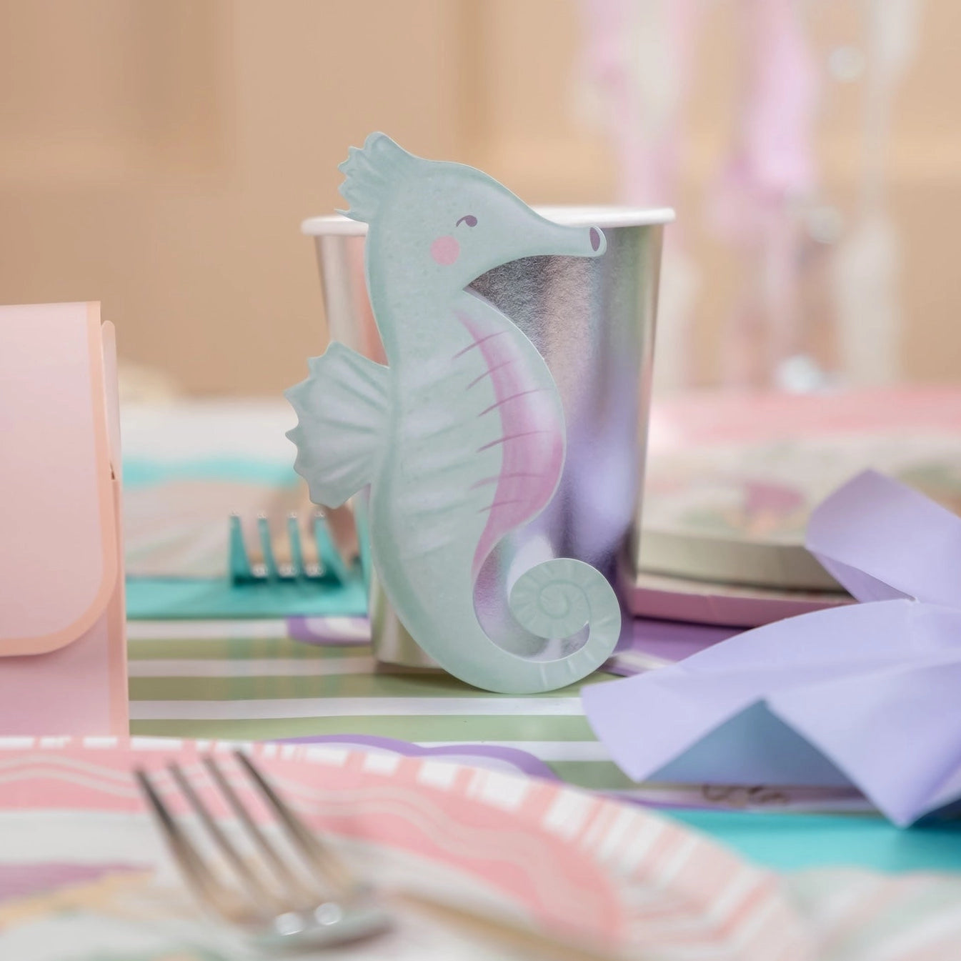Mint green seahorse sticker with blush details