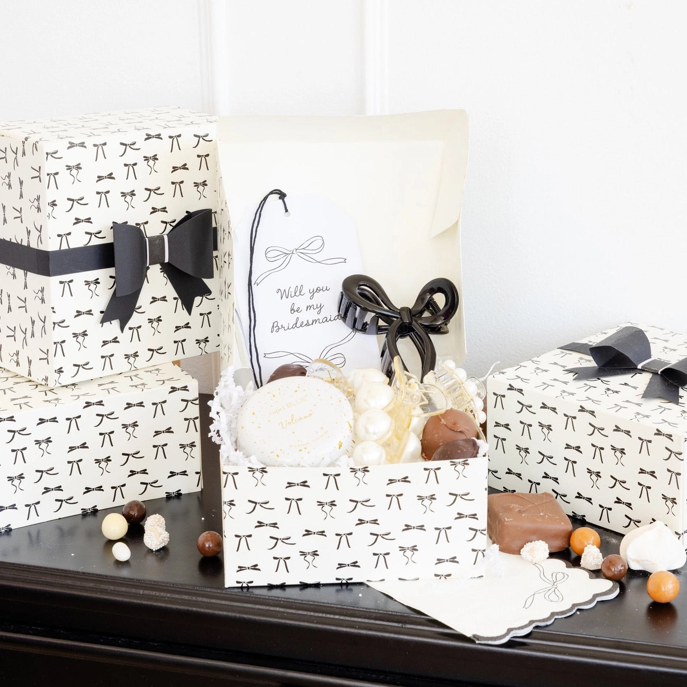 White treat box with black bow pattern