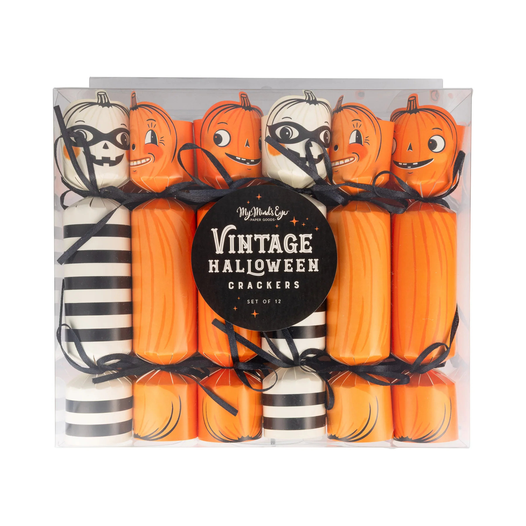 Packaged vintage Halloween crackers with orange and white pumpkins in a clear box.