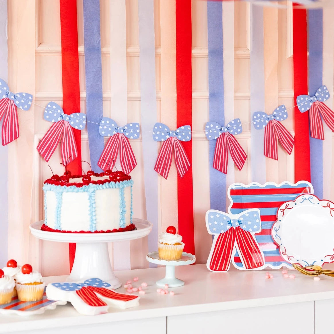 Decorative setup with red, white, and blue  bow party decorations
