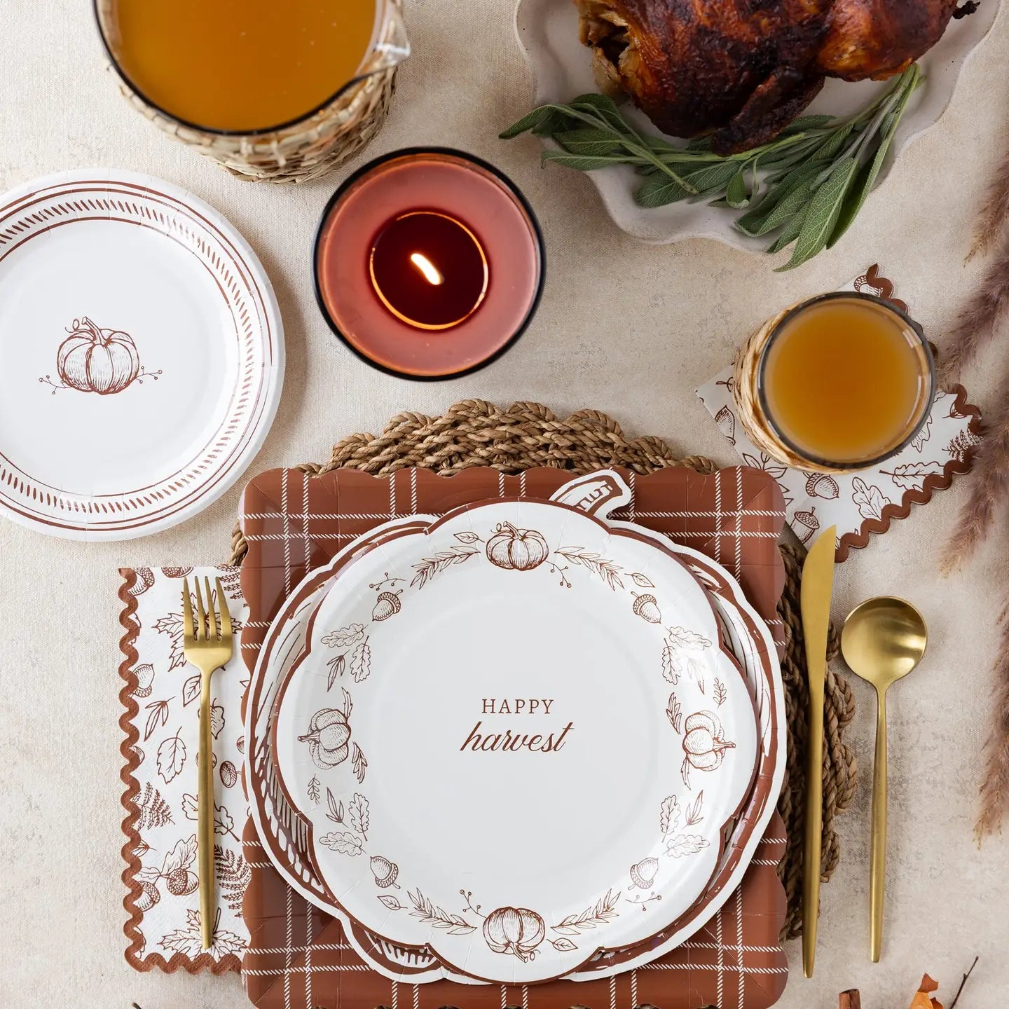 Cream paper guest towel with illustrated brown fall foliage