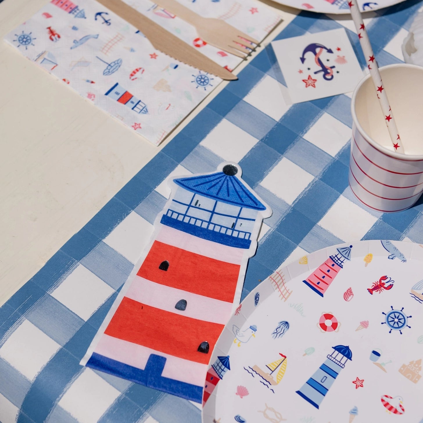 Lighthouse shaped napkins for coastal party tables