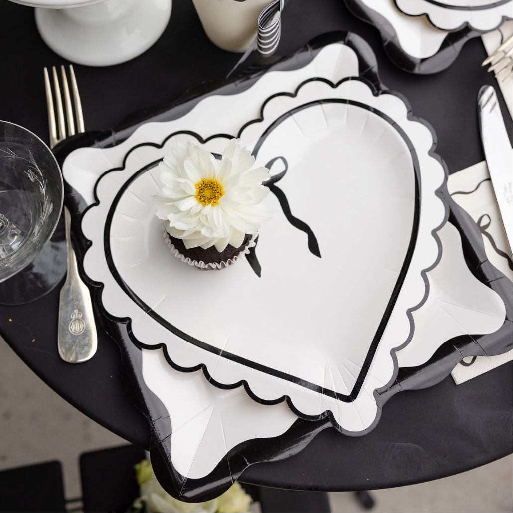 Cream dessert napkin with black bow design