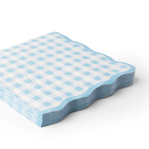 Blue gingham scalloped lunch napkins stacked