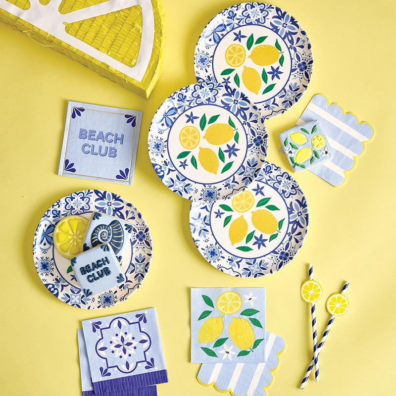 Mediterranean lemon dessert napkins with yellow lemons and blue background