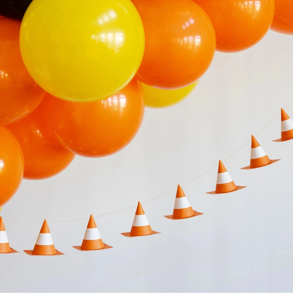 Construction themed banner displayed with balloons