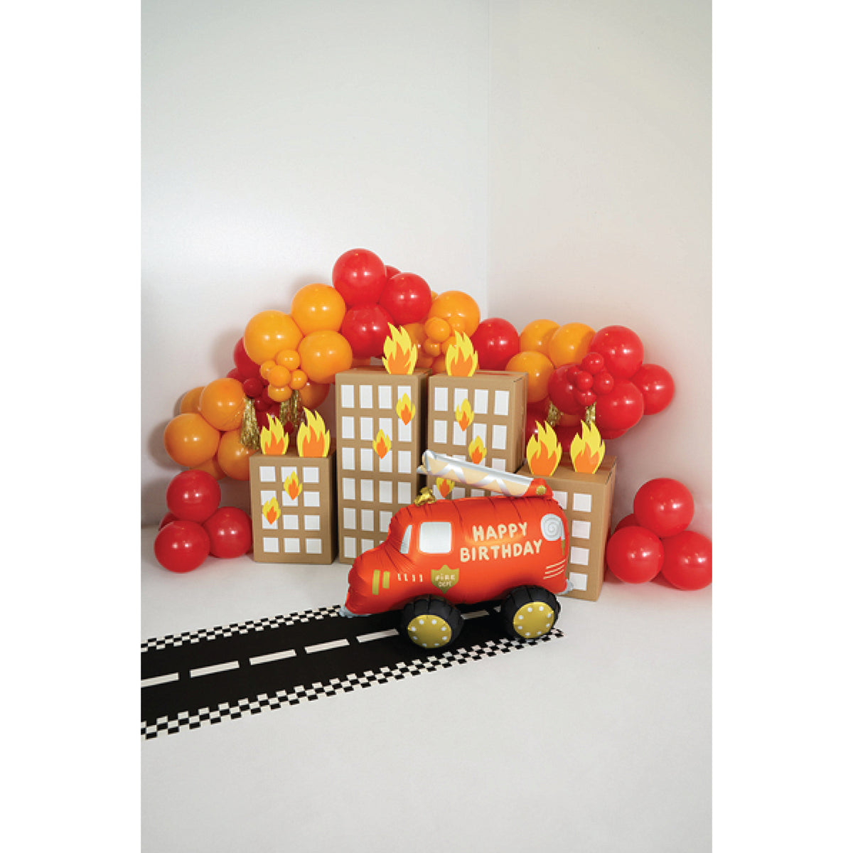Red fire truck balloon with Happy Birthday message and ladder