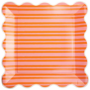 Orange and pink striped scalloped dinner plates