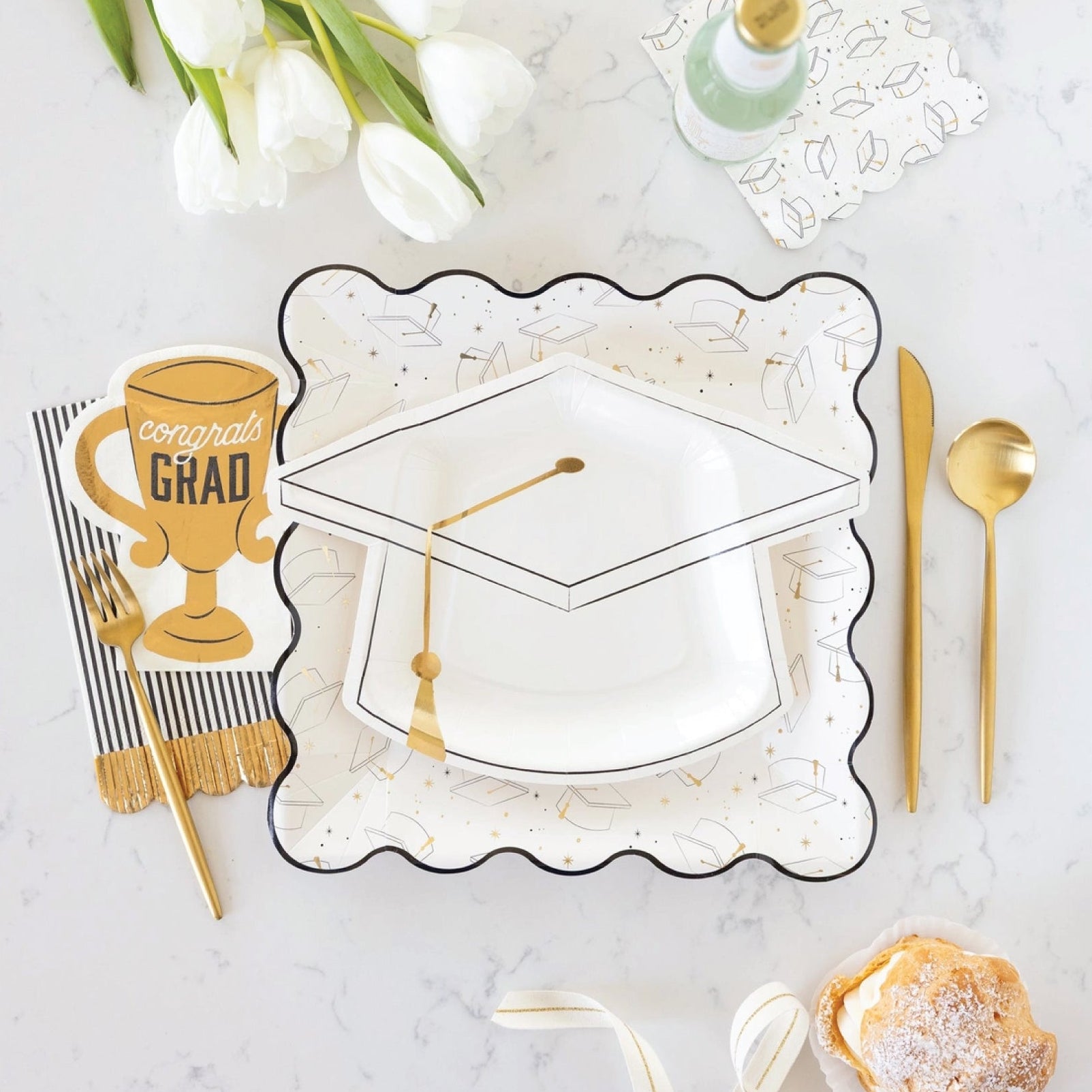 Graduation party plate shaped like cap with black outline