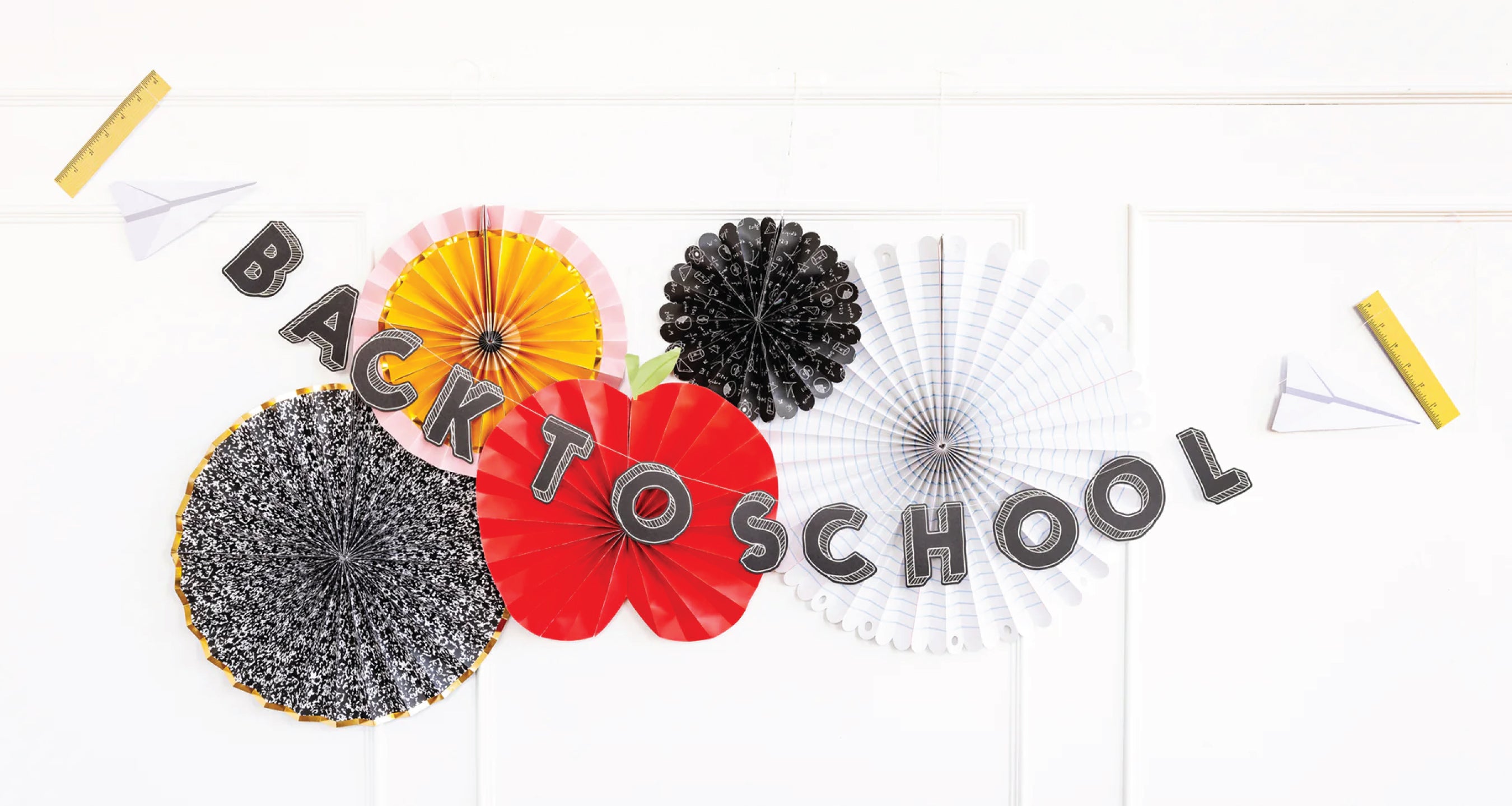 Back to School Backdrop with paper fans and banner