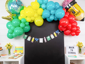 back to school banner and balloons
