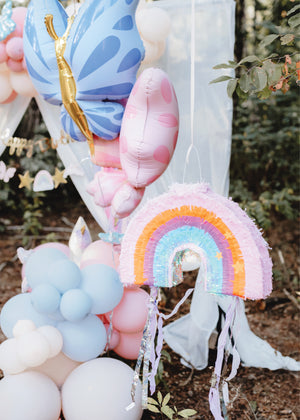 Rainbow piñata hanging 