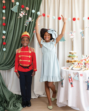 Children enjoying Nutcracker party decorations