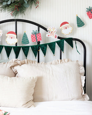 Whimsical Christmas Banner on wall | The Party Darling