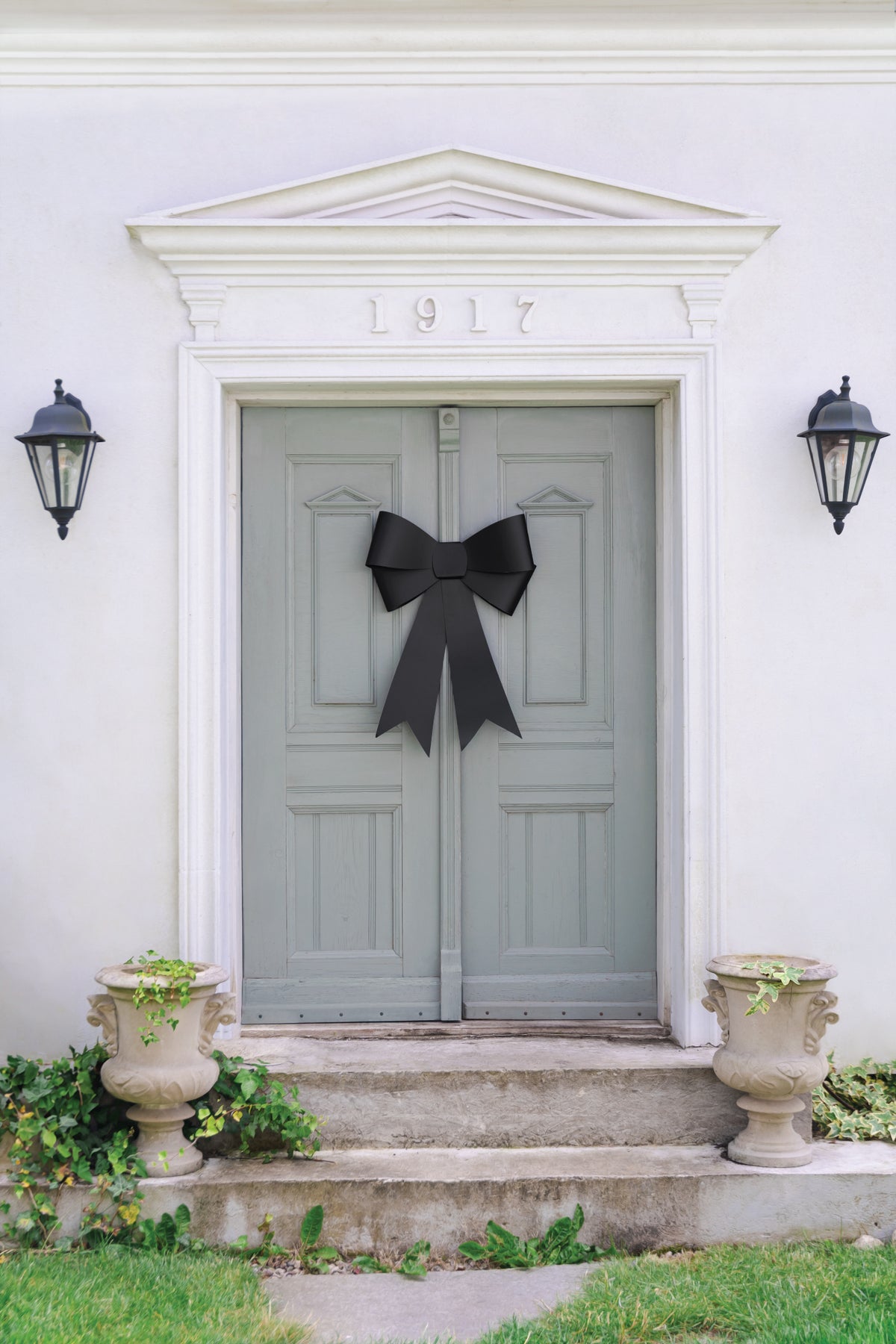 Decorative black bow on front door