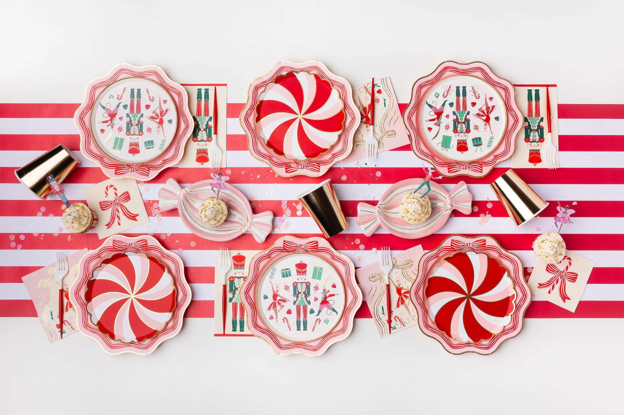 Scalloped pink paper plate with striped border and gold edge