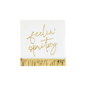 White paper dessert napkins with gold foil Feelin' Spritzy script