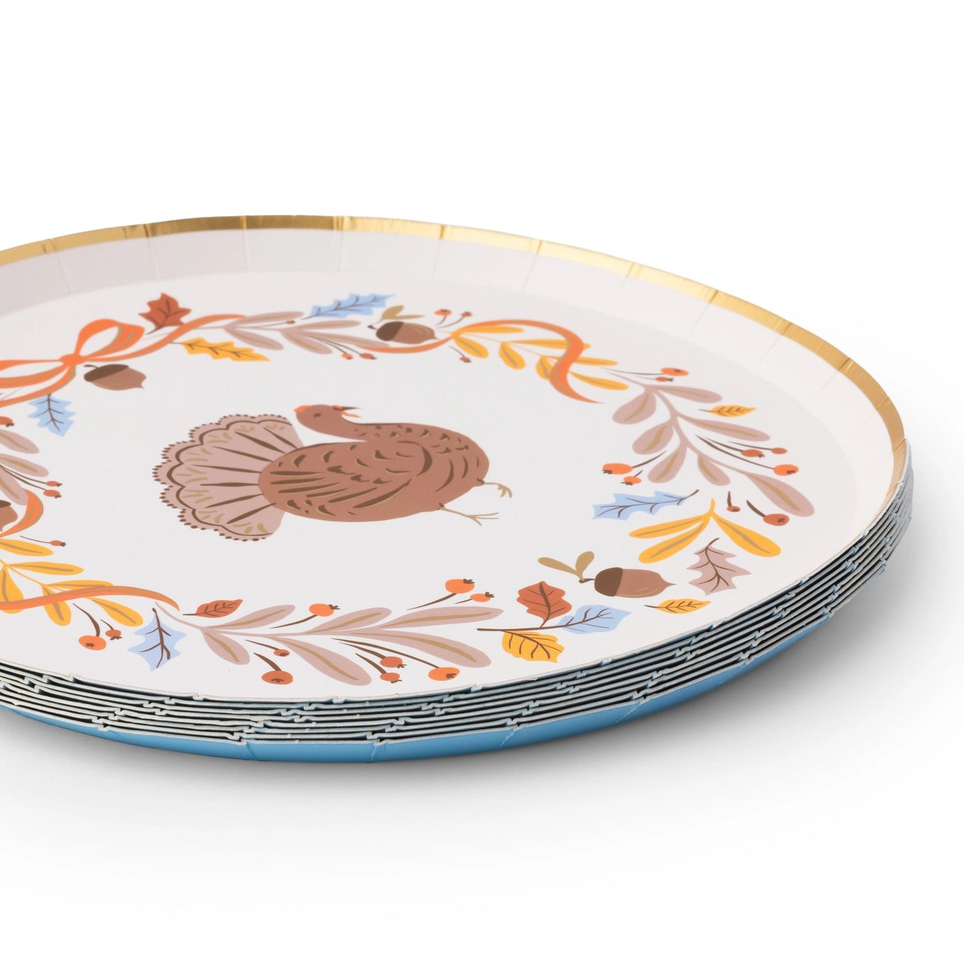 Turkey paper plate surrounded by colorful autumn foliage