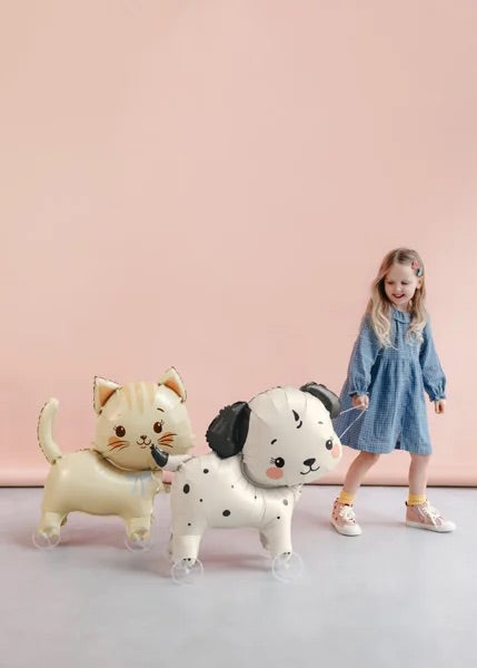 Cream puppy balloon decoration with rolling wheels