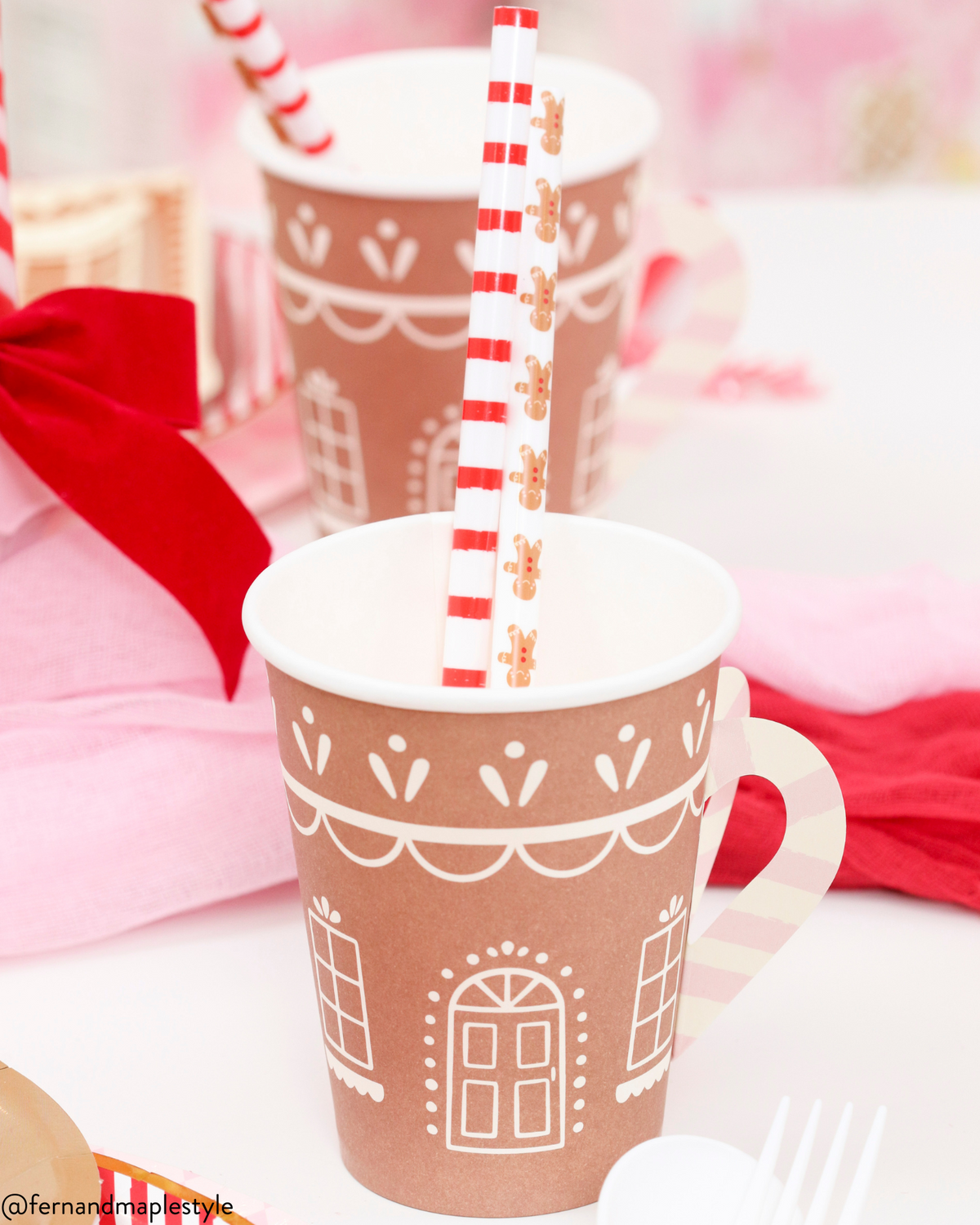 https://thepartydarling.com/cdn/shop/files/gingerbread-house-paper-cups-straws_1200x.png?v=1701228552