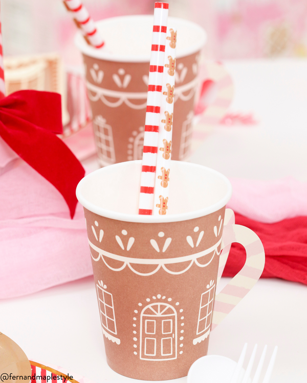 https://thepartydarling.com/cdn/shop/files/gingerbread-house-paper-cups-straws_600x.png?v=1701228552