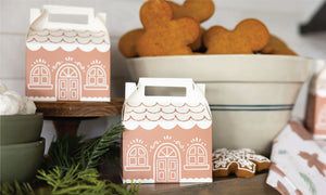 Gingerbread House Favor Boxes on a shelf