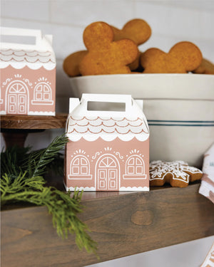 Gingerbread House Treat Boxes on a shelf