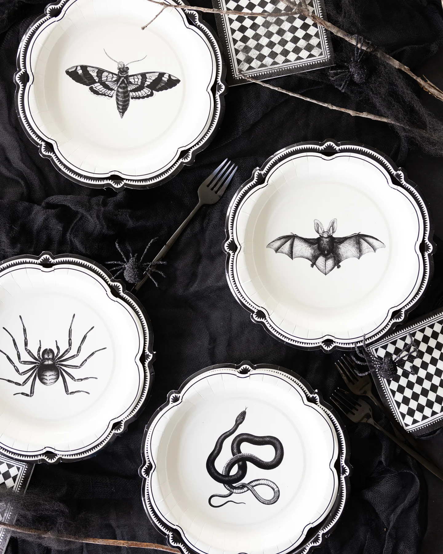 Halloween plates with black checkered paper napkins