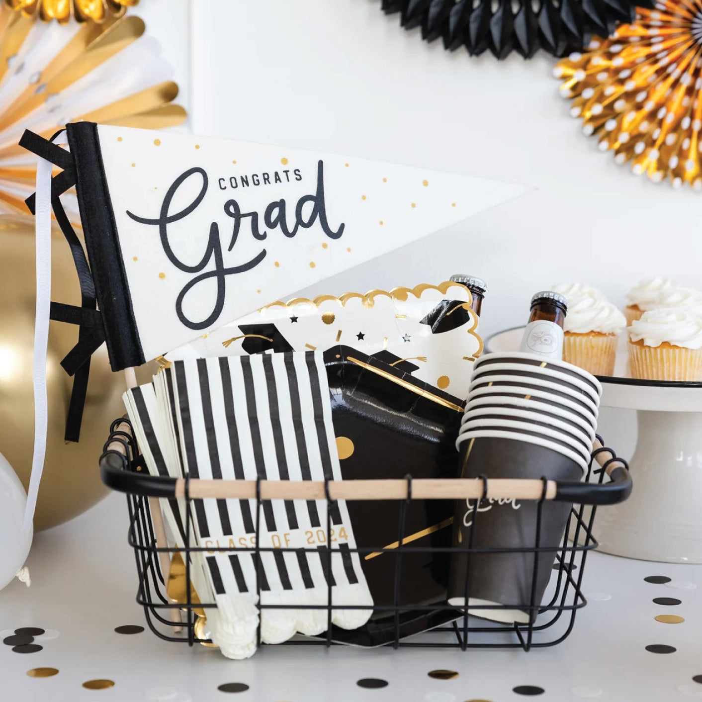 Wired basket of graduation party supplies