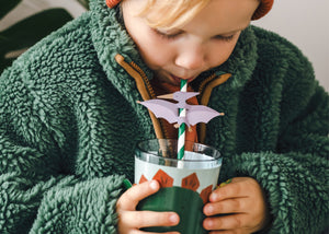Kid using Green & White Striped Pterodactyl Paper Straw | The Party Darling