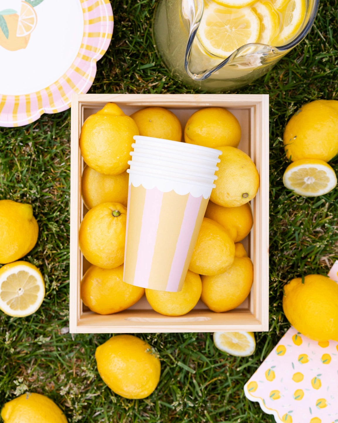 Pink and yellow cups for lemon themed parties