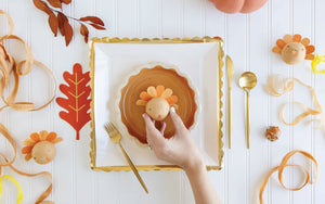 Placing a Kid's Turkey Surprise Ball on Plate | The Party Darling