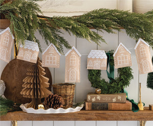 Puffy Felt Gingerbread Houses Garland decorated above a Christmas mantle